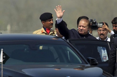 Prime Minister Nawaz Sharif waves after attending the Pakistan Day parade in Islamabad March 23, 2015. 