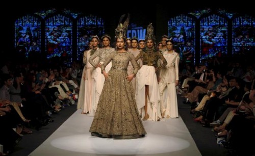 Models present creations by Pakistani designer Fahad Hussayn during the Fashion Pakistan Week (FPW) in Karachi April 1, 2015. Reuters