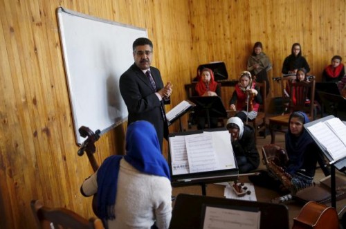 Ahmad Naser Sarmast, head of Afghanistan's National Institute of Music, speaks to members of the Zohra orchestra, an ensemble of 35 women, in Kabul, Afghanistan April 4, 2016.  REUTERS/Ahmad Masood