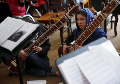 Members of the Zohra orchestra, an ensemble of 35 women, attend a rehearsal at Afghanistan's National Institute of Music, in Kabul, Afghanistan April 4, 2016.  REUTERS/Ahmad Masood