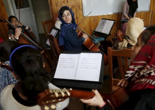 Fakria Azizi, a member of the Zohra orchestra, an ensemble of 35 women, practises during a session, at Afghanistan's National Institute of Music, in Kabul, Afghanistan April 4, 2016.  REUTERS/Ahmad Masood
