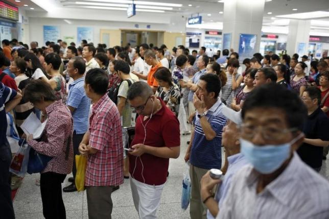 China aims to double doctor numbers as cure for healthcare woes