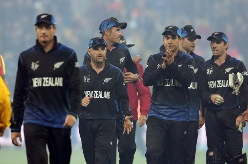 Martin Guptill leads New Zealand off after beating the West Indies in their Cricket World Cup quarterfinal match in Wellington