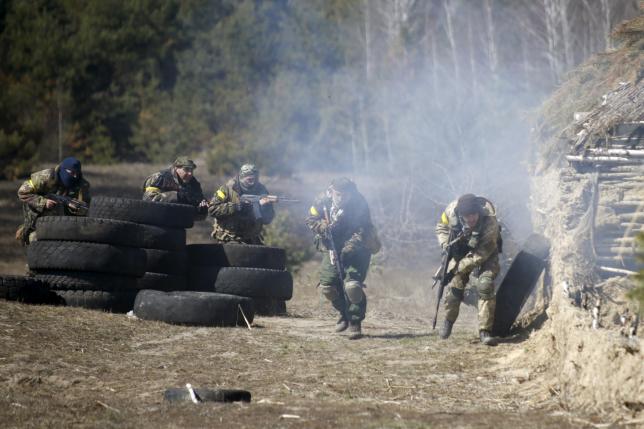 Ukraine military, rebels accuse each other of increased attacks