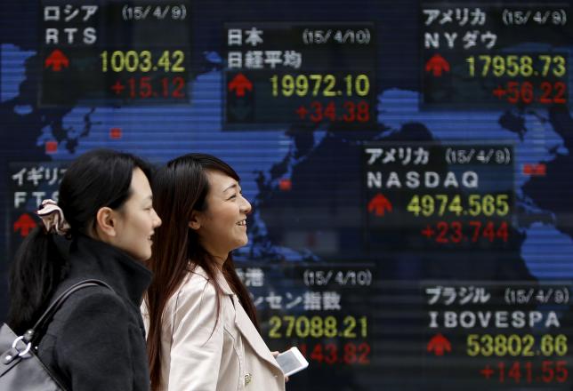 Asian shares edge off 7-year highs as Fed awaited 