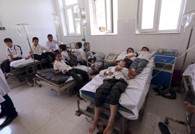 Afghan aid workers found dead; 100 students hospitalised after meal