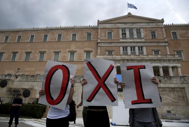 Greece imposes capital controls as crisis deepens