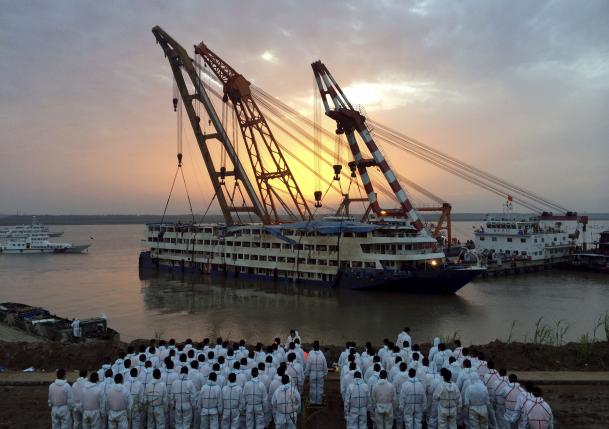 China puts ship disaster survivors at 12, says all 442 bodies found