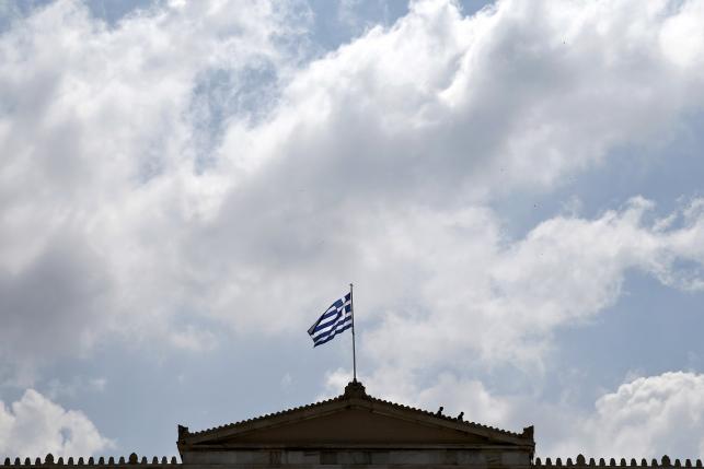 Pressing for Greek concessions, Merkel and Hollande keep Tsipras waiting