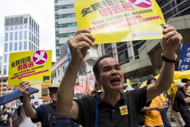 Hong Kong braces for new democracy showdown as poll reform vote looms