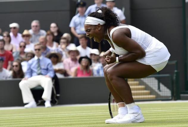 Serena overcomes early wobble to ease through