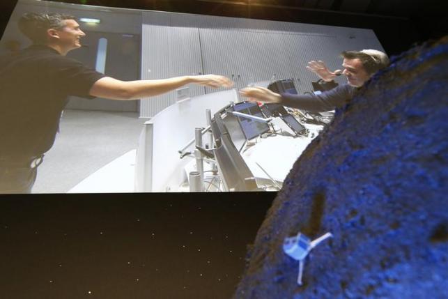 European space probe, thought lost, awakes in comet's shadows