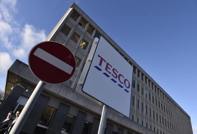 Tesco shows signs of recovery after profit collapse