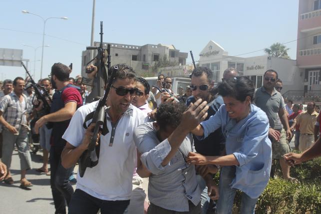 Gun attack kills at least 37, including Europeans, at Tunisian beachside hotel