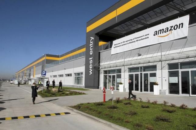 EU anti-trust chief warns Amazon, wary about telecom mergers