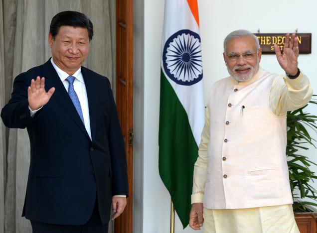China vows to enhance cooperation with India