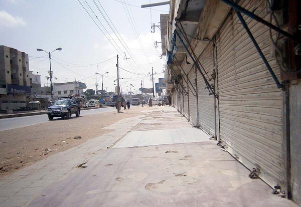 Traders observe shutter-down strike against increase in withholding tax 