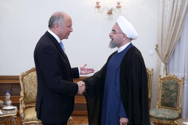 Fabius, visiting Tehran, invites Rouhani to France