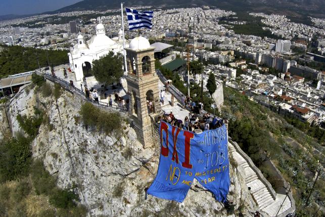 Greece votes in referendum with future in euro in doubt