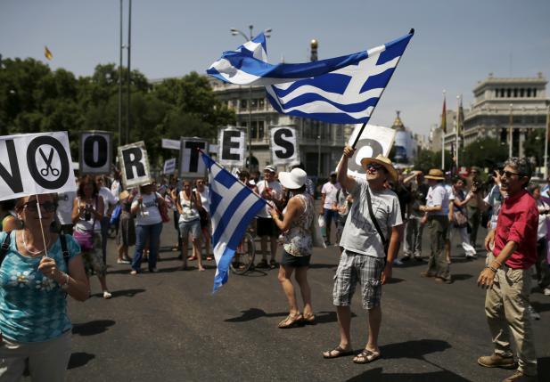 Greeks defy Europe's rescue package with overwhelming referendum 'No'