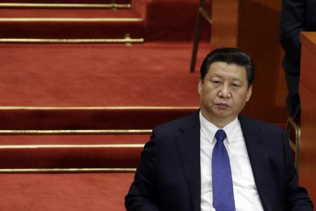 Chinese President Xi says state industry the backbone of economy amid reforms