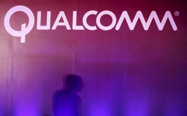 Qualcomm slashes jobs and costs, says may split itself up