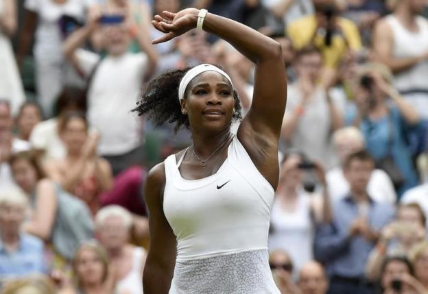 Djokovic, Serena turn up heat as Wimbledon sizzles