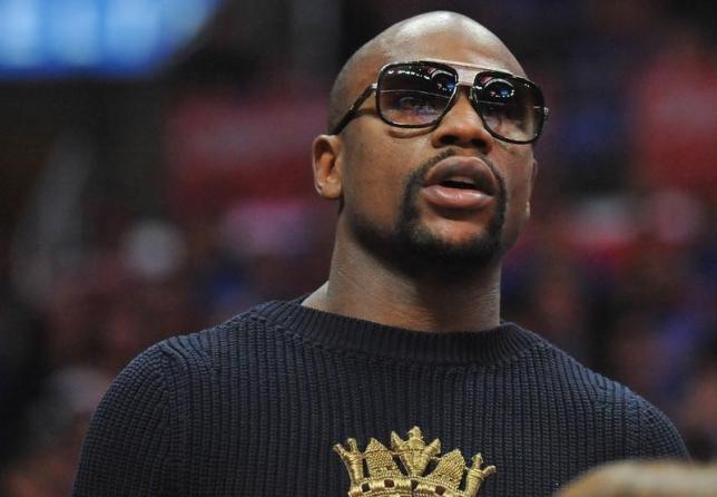 Mayweather stripped of title he won in Pacquiao fight