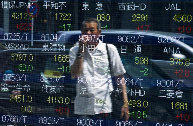 Asian shares, dollar up on Fed's optimism; earnings in focus