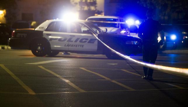 After US shooting, high cost of more security vexes movie theaters