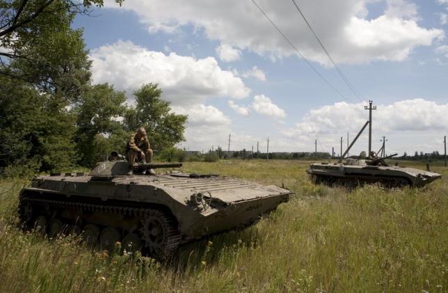 Ukraine, rebels reach preliminary deal to broaden weapons withdrawal