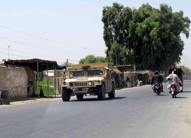 Afghan forces regain control of a symbolic district in south