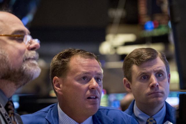 Wall St falls after China devaluation