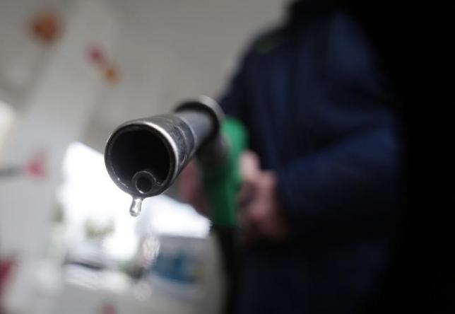 Oil sinks to six-month low amid weak data, slump in gasoline