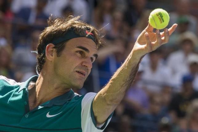 Federer faces danger match against big-serving Isner