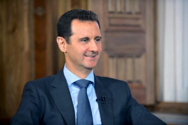 US says Assad must go, timing down to negotiation