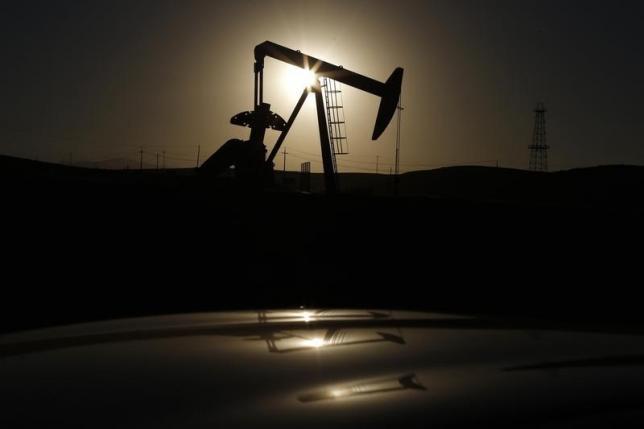 Oil falls with Wall Street but US crude posts another weekly gain