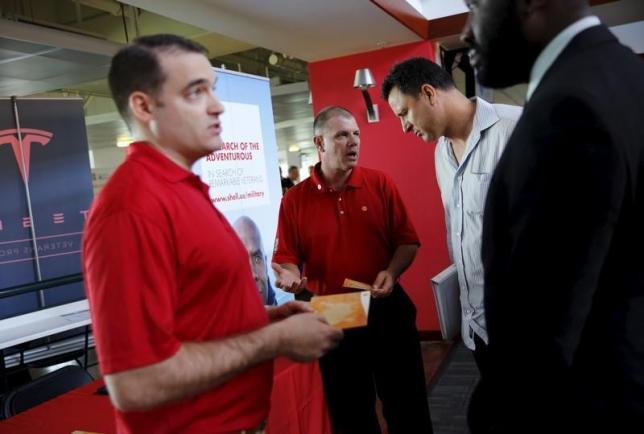 US jobless claims at eight-week low; housing starts fall