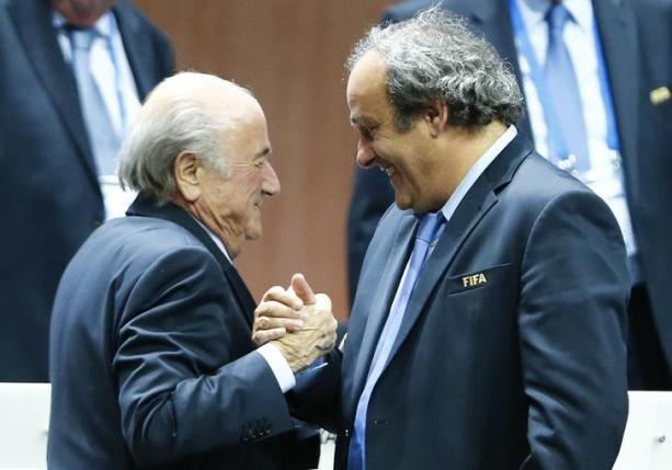 World soccer rocked by suspension of Blatter and Platini