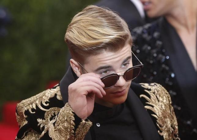Court upholds charges against photographer who chased Justin Bieber