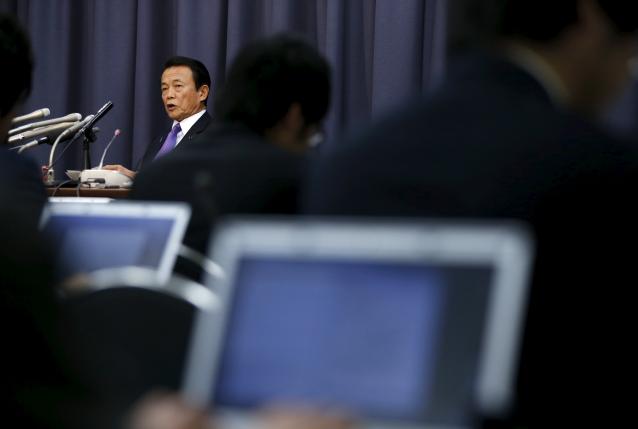 Japan government approves $800 billion budget; fiscal goal looks elusive