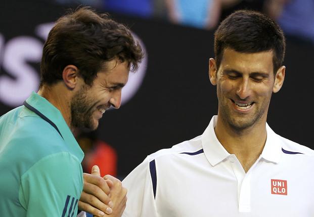 Djokovic suffers 'brain freeze' in Simon scare