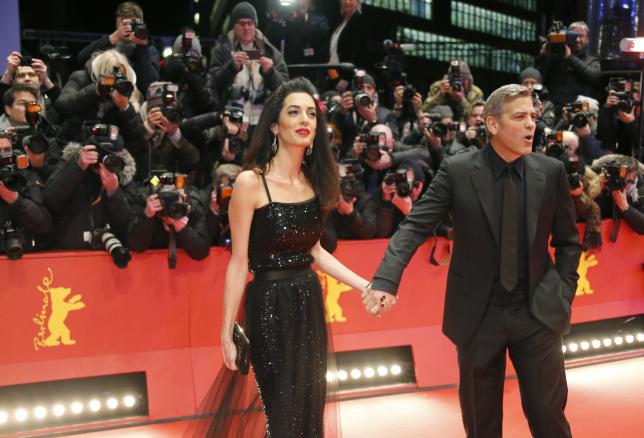 Clooney says refugee crisis is huge, US Muslim ban won't happen