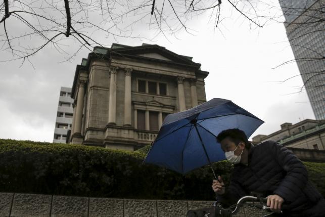 Japan economy shrinks more than expected, highlights lack of policy options