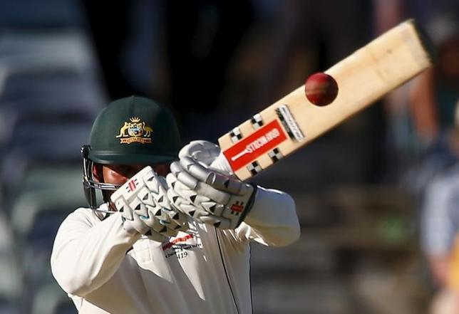 Voges cashes in as Australia forge huge lead