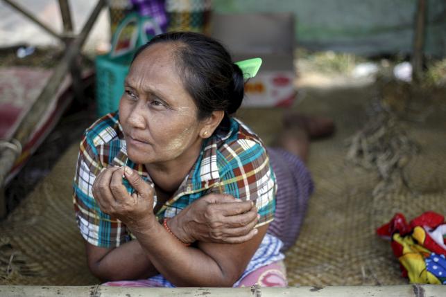 In Myanmar, slum eviction highlights Suu Kyi's military challenge