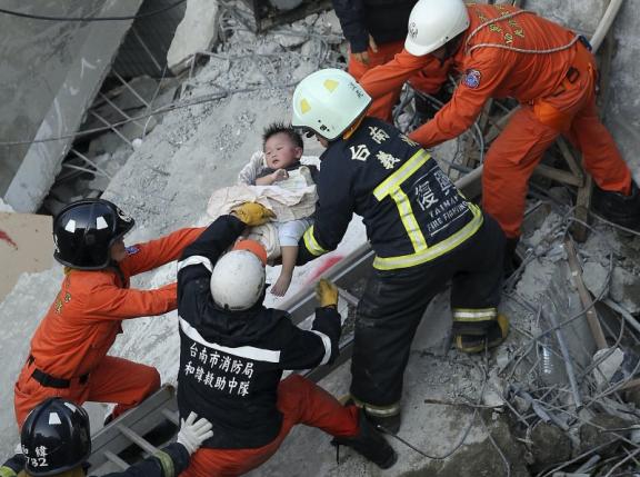Taiwan quake kills at least 12, fells apartment block