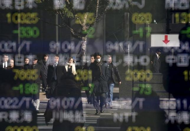 Asian shares slip as crude resumes drop