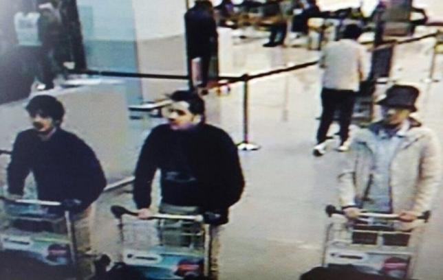 Belgium names Brussels bomber brothers, key suspect on run