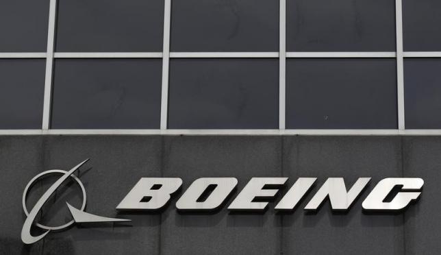 Boeing says it will cut about 4,000 jobs by mid-2016